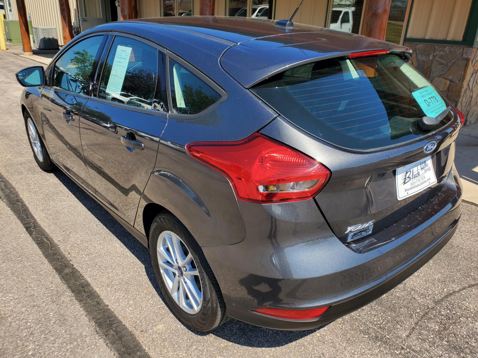 2016 Tan /Black Ford Focus SE (1FADP3F23GL) with an 2.0L 4Cyl GDI TI-VCT engine, 6-Speed Powershift Automatic transmission, located at 1600 E Hwy 44, Rapid City, SD, 57703, (605) 716-7878, 44.070232, -103.171410 - Photo #32